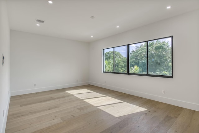 18416 Symphony Ct, Jupiter, FL 33458 - empty room featuring baseboards, recessed lighting, and light wood-type flooring