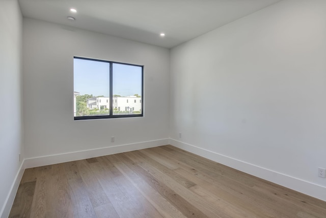 18416 Symphony Ct, Jupiter, FL 33458 - unfurnished room with light wood-style floors, baseboards, and recessed lighting