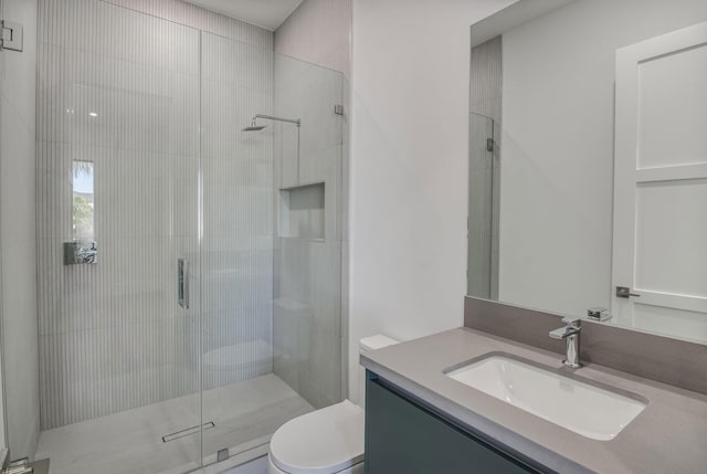 18416 Symphony Ct, Jupiter, FL 33458 - bathroom featuring toilet, vanity, and a stall shower