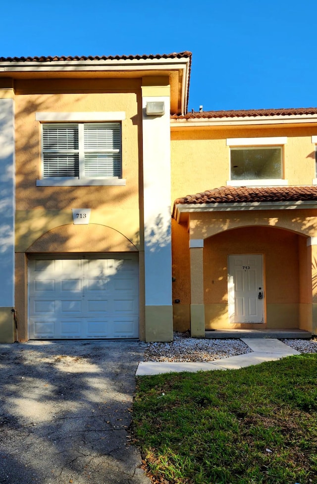 view of front of property with a garage