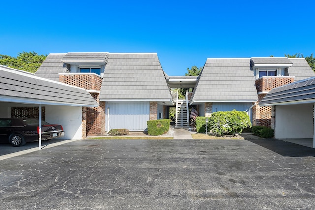 view of property featuring a carport