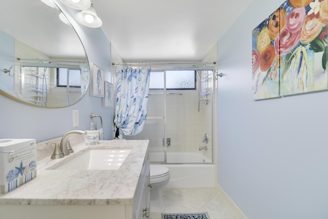 545 Bay Colony Dr N, Juno Beach, FL 33408 - bathroom with bath / shower combo with glass door, vanity, toilet, tile patterned floors, and baseboards