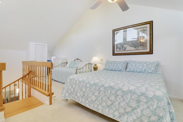 545 Bay Colony Dr N, Juno Beach, FL 33408 - carpeted bedroom with vaulted ceiling and a ceiling fan