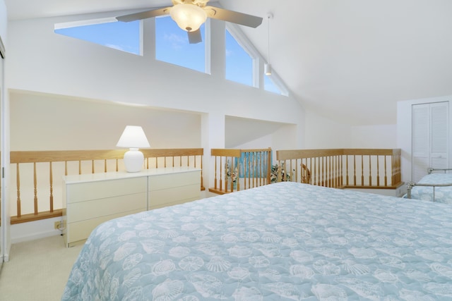 carpeted bedroom featuring ceiling fan, high vaulted ceiling, and multiple windows