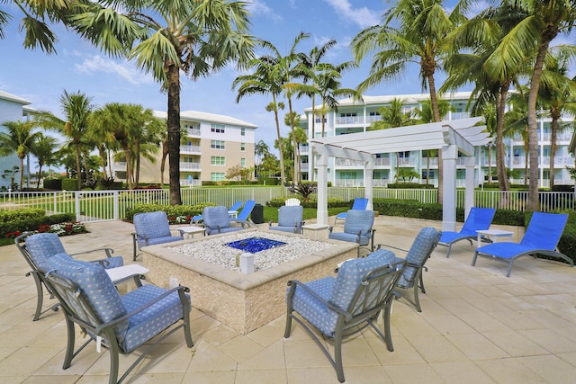 view of patio / terrace featuring a fire pit and a pergola