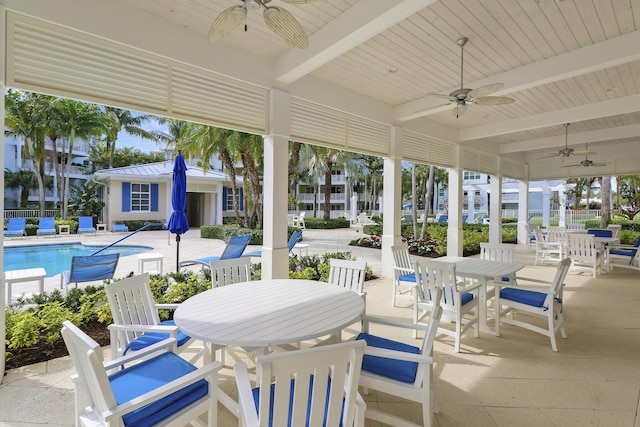 view of patio / terrace featuring ceiling fan and a community pool