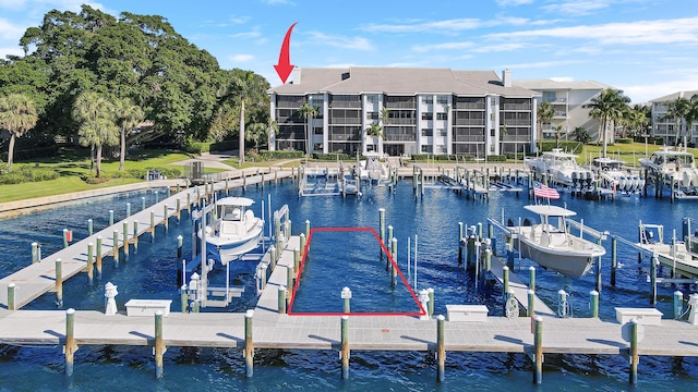 dock area featuring a water view