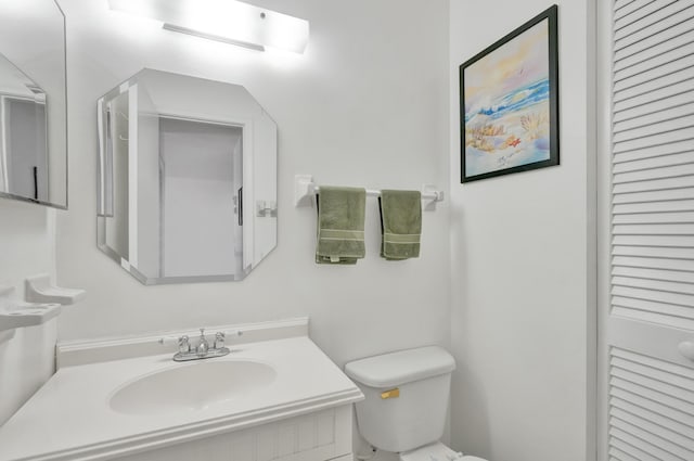 bathroom featuring sink and toilet