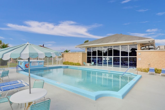 view of pool featuring a patio