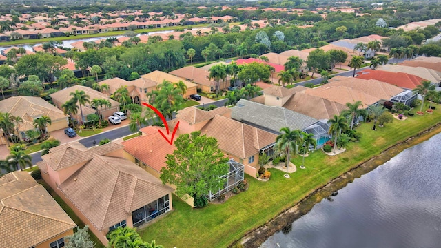 drone / aerial view featuring a water view