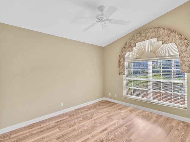 unfurnished room with ceiling fan and light hardwood / wood-style flooring