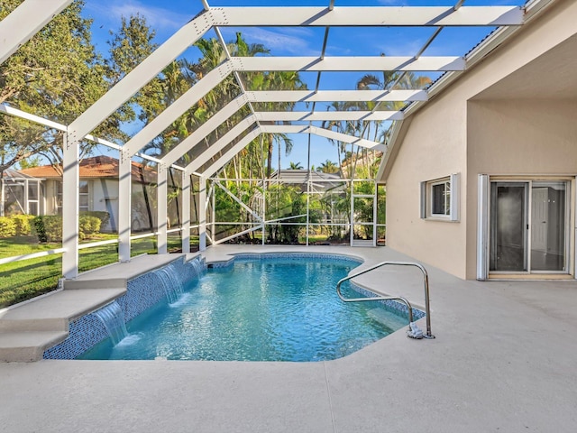 view of swimming pool with a patio, pool water feature, and glass enclosure