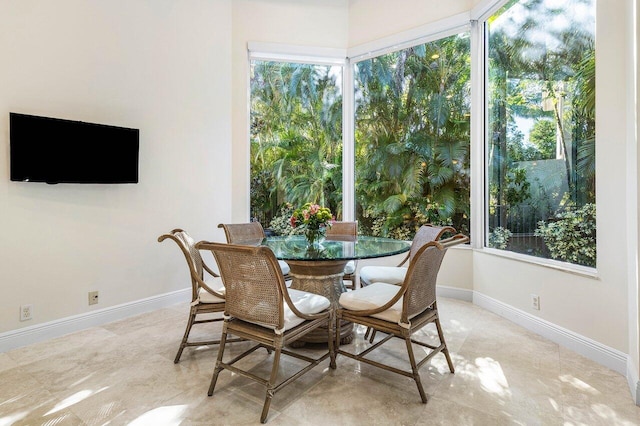 sunroom featuring a healthy amount of sunlight