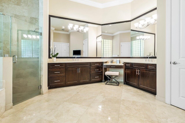 bathroom featuring a chandelier, a shower with shower door, and crown molding