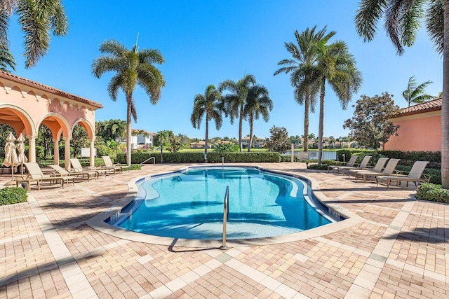 view of swimming pool featuring a patio