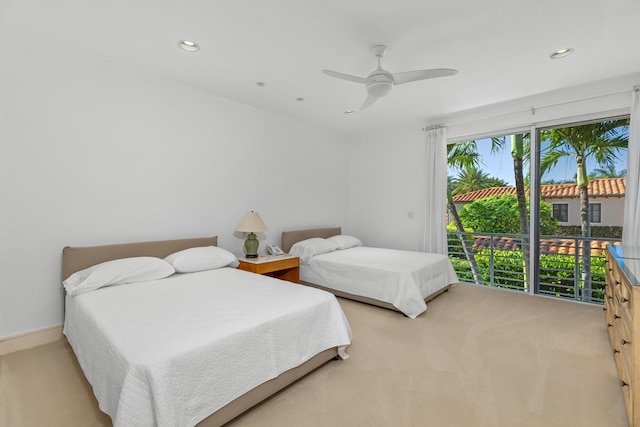 bedroom featuring light carpet and ceiling fan