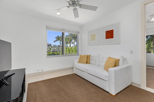 interior space featuring carpet flooring and ceiling fan