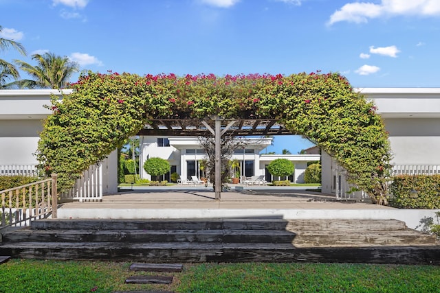 view of property's community featuring a pergola