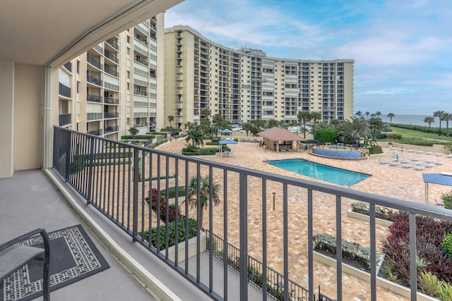 balcony featuring a water view