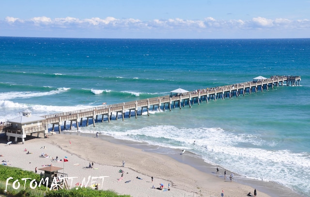 bird's eye view with a beach view and a water view