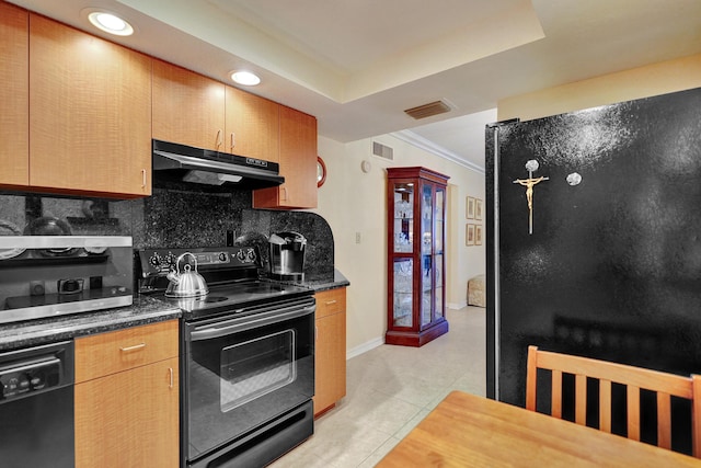 kitchen featuring tasteful backsplash, a raised ceiling, crown molding, black appliances, and light tile patterned flooring