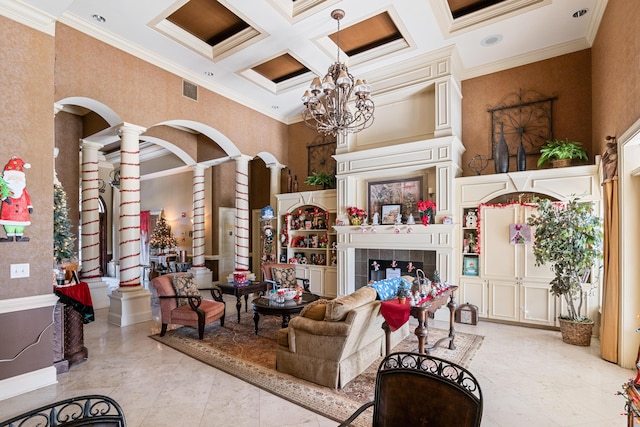 living room with decorative columns, crown molding, a high ceiling, and coffered ceiling