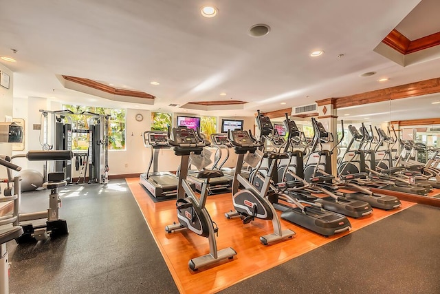 gym featuring a wealth of natural light