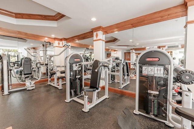 workout area with crown molding