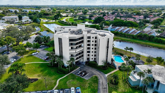 drone / aerial view featuring a water view