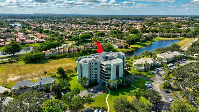 birds eye view of property featuring a water view