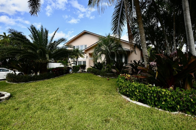 view of front of house with a front yard