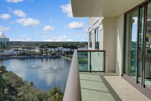 balcony featuring a water view