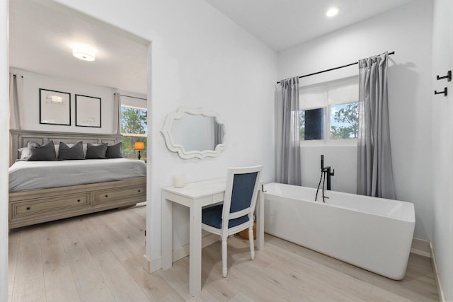 bedroom featuring light hardwood / wood-style floors