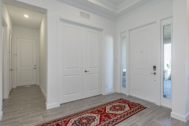 foyer entrance with crown molding