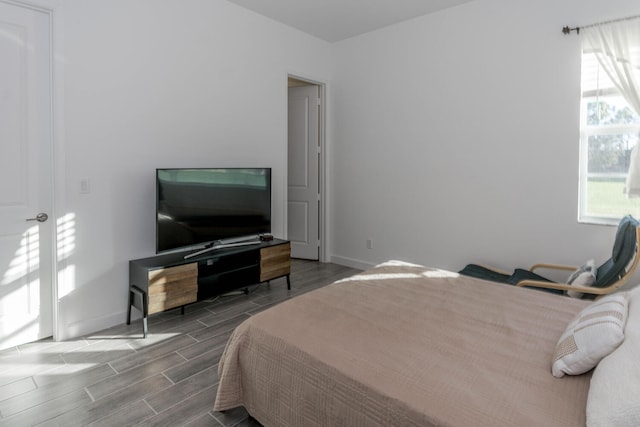 bedroom with wood-type flooring