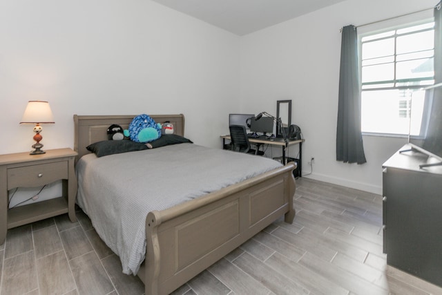 bedroom featuring light wood-type flooring