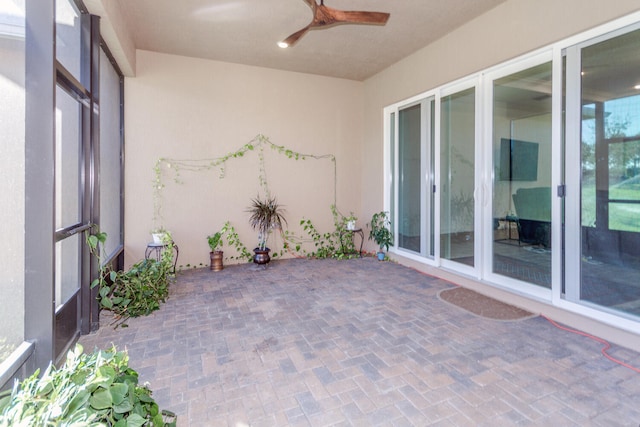 view of patio with ceiling fan