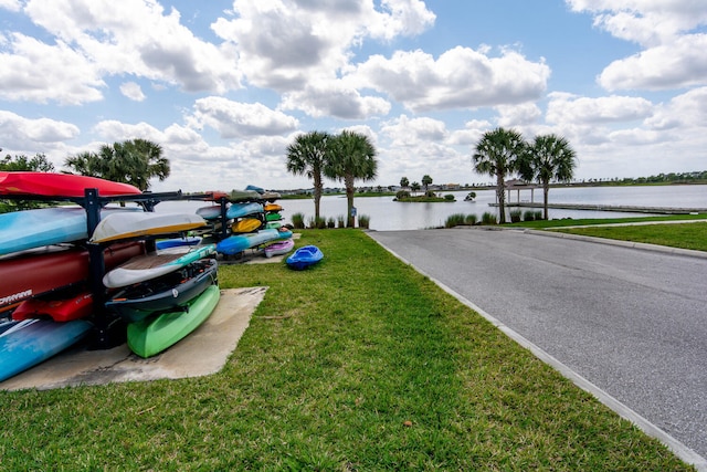 exterior space with a water view