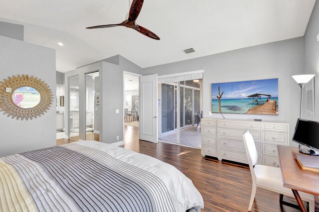 bedroom featuring access to exterior, ensuite bathroom, vaulted ceiling, ceiling fan, and dark wood-type flooring