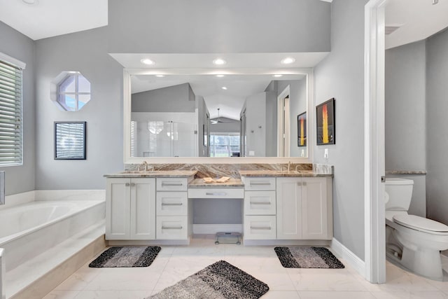 full bathroom with toilet, shower with separate bathtub, vanity, and vaulted ceiling