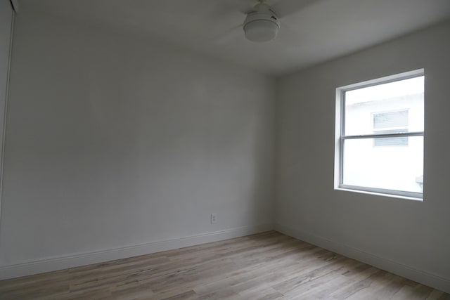 unfurnished room featuring light hardwood / wood-style floors