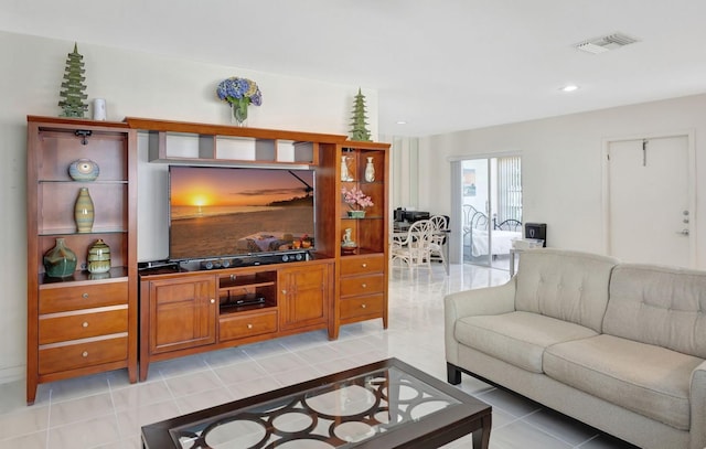 living room featuring light tile patterned floors