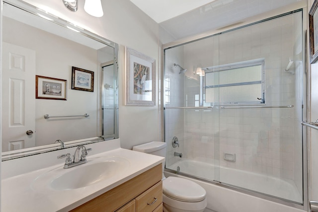 full bathroom with toilet, vanity, and combined bath / shower with glass door