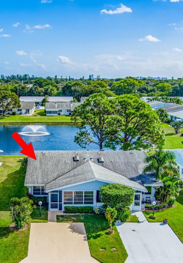 drone / aerial view featuring a water view