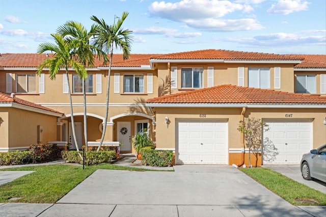 view of property featuring a garage