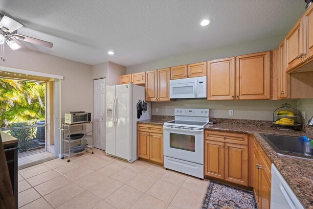 dining space featuring a chandelier and light tile patterned floors