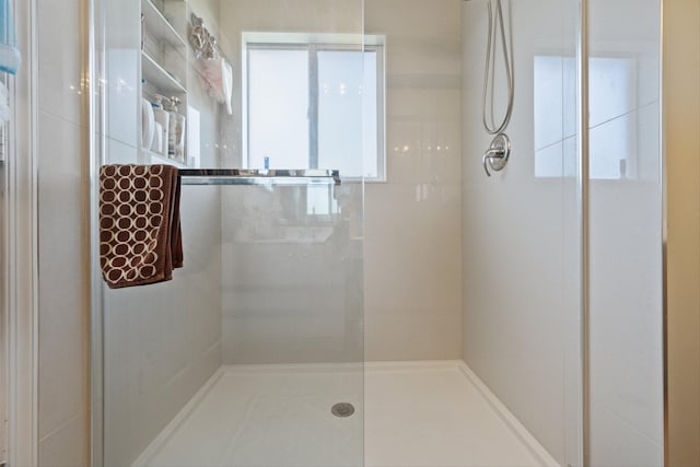 bathroom featuring an enclosed shower