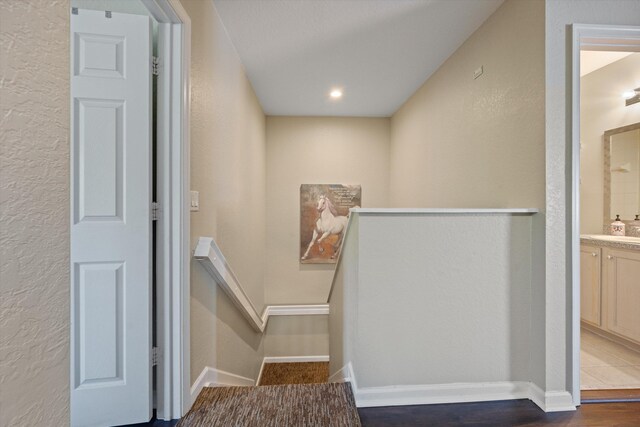 stairway with baseboards