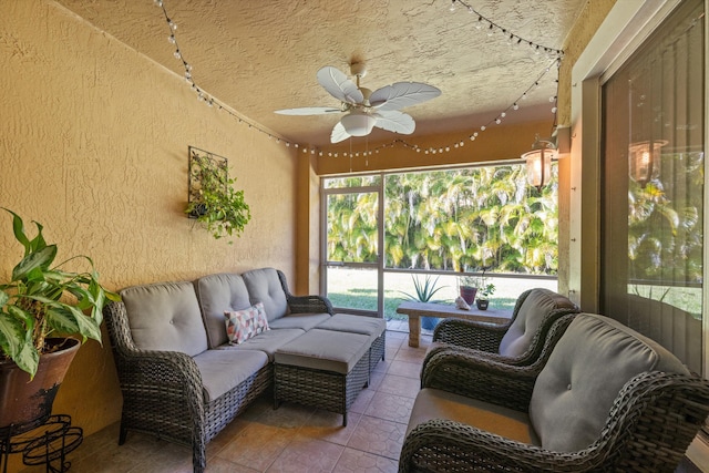 sunroom featuring tile patterned floors, a textured wall, and a textured ceiling