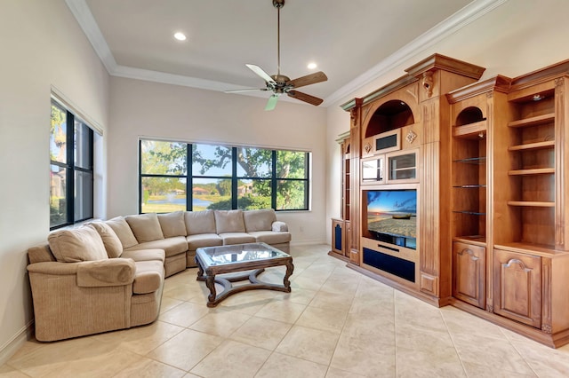 living room with ceiling fan, light tile patterned floors, and ornamental molding